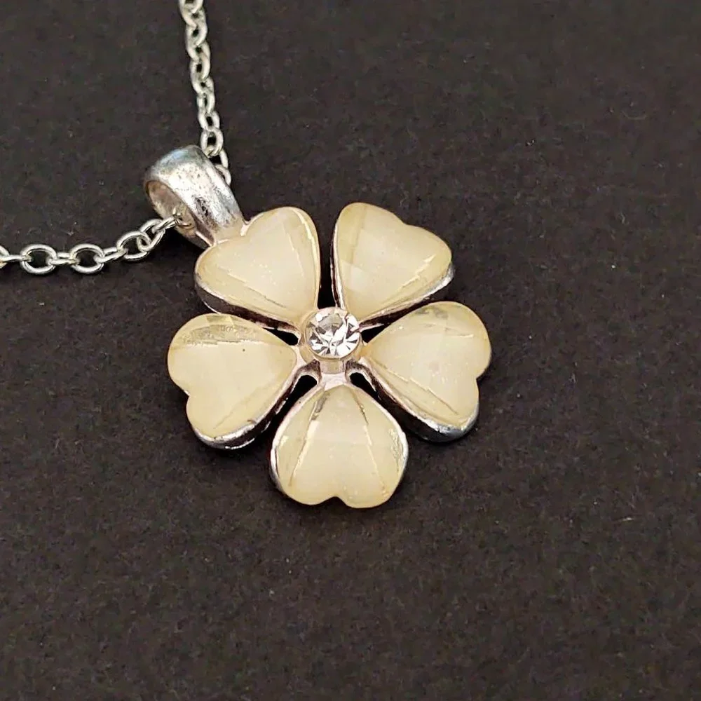 Cream flower pendant necklace with cz center and silver accents
